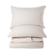 Atelier Solid Cream Quilt Set β soft polyester velvet with star imprints, styled on bed