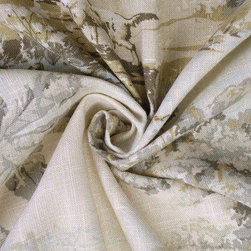 Close-up of Solene Natural/Aqua bedding fabric showing its woven texture and detailed scenic toile print
