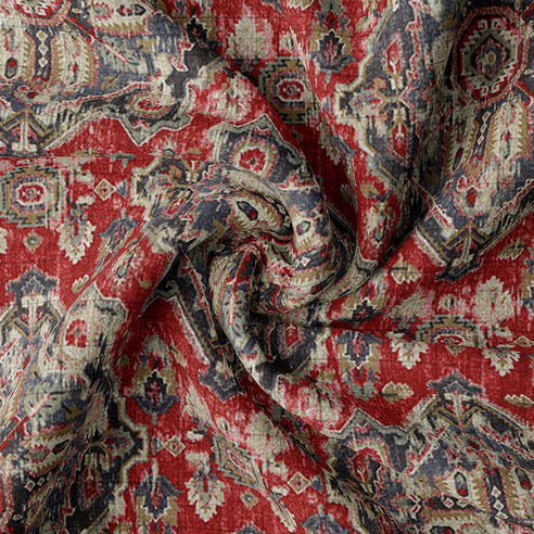 Close-up of Charvi duvet cover showing red and navy geometric pattern with reversible ivory cotton percale backing