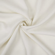Close-up of Adrianne Pearl bedding fabric showing its subtle woven texture in ivory