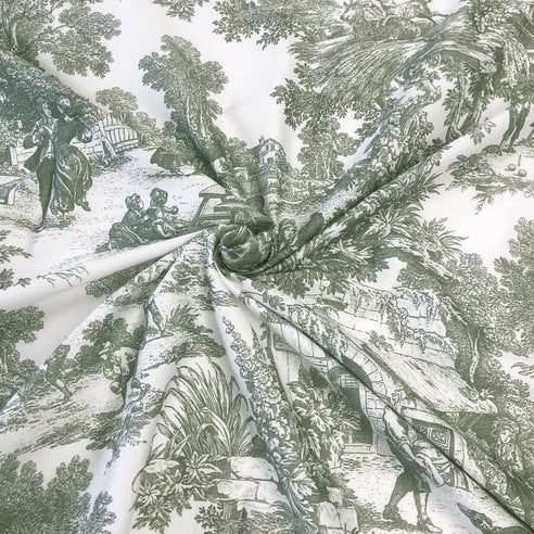 Patterned fabric with green grass and ivory design of people and landscape
