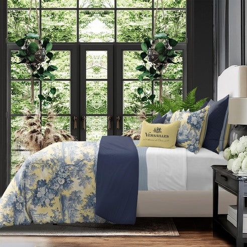 Giverny bedding ensemble featuring artistic floral pattern on soft butter yellow base, OEKO-TEX certified cotton