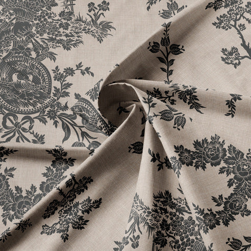 Fabric with black floral and decorative patterns on a beige background