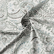  Close-up of Paisley Seafoam bedding fabric showing seafoam green and grey paisley and floral motifs on white