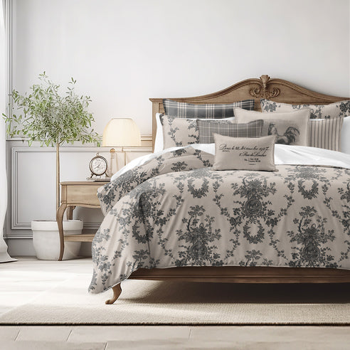Bedroom with floral-patterned bedding and wooden headboard