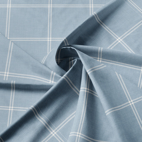Blue checkered fabric with a white line pattern