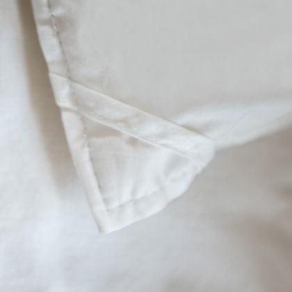 Piatra Wool Duvet by St Genève styled on bed – Natural Merino Wool, Multi-Season Comfort, Euro Twin to King Sizes