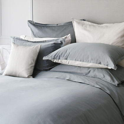 t. Genève Capri Duo 90 colour sateen duvet cover styled on a luxury bed