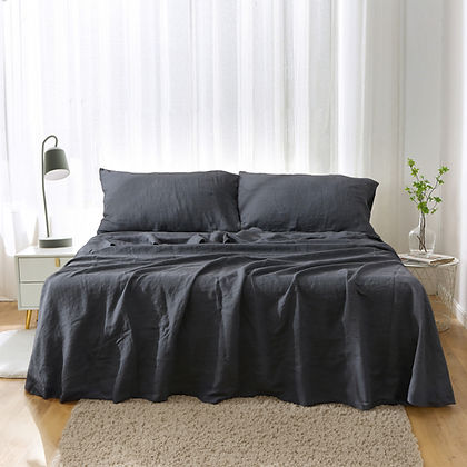 French Linen Sheet Set by Highland Feather styled on bed – Natural Breathable Bedding in Sage Green, Charcoal Grey, Khaki & White