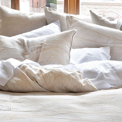 Saturna Jacquard pillows and duvet in natural light – luxurious cotton linen bedding by St. Genève