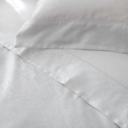 Eterna Collection Lumina Jacquard Duvet Cover styled on bed – St. Genève elegant luxury bedding