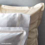 St. Genève Capri Double Satin Stitch pillowcases in cream and white — close-up of double satin stitch border detail