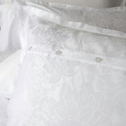 Eterna Collection Fiori Jacquard Duvet Cover styled on bed – St. Genève elegant floral bedding