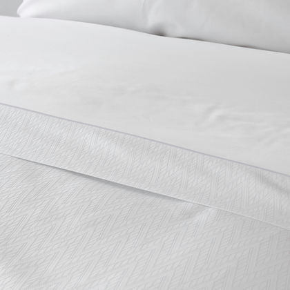 Eterna Collection Diamonte Jacquard Duvet Cover styled on bed – St. Genève diamond luxury bedding