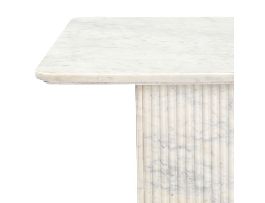Roland square white marble coffee table styled in modern formal living room