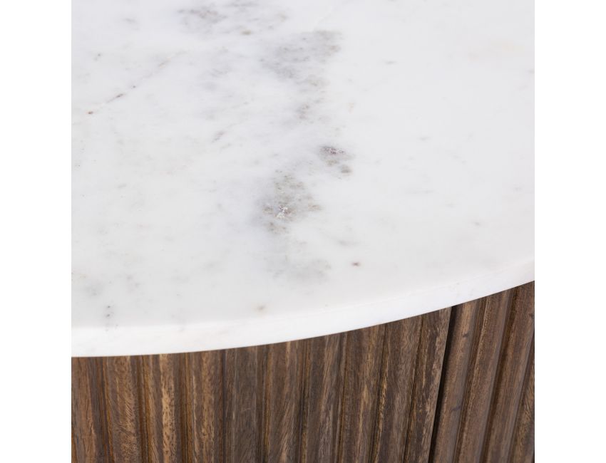 Reyna round marble coffee table styled in mid-century modern living room
