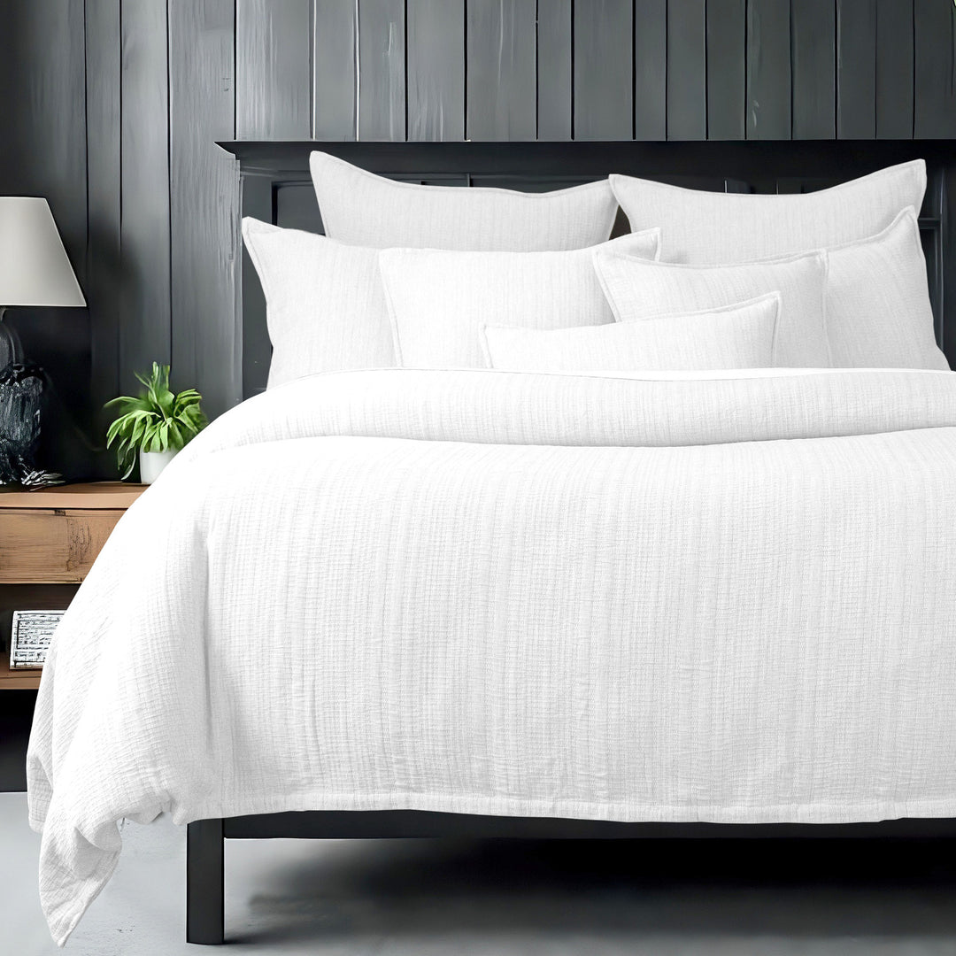 Payton COVERLET Set in pick-stitched cotton on styled bed - Made in Canada