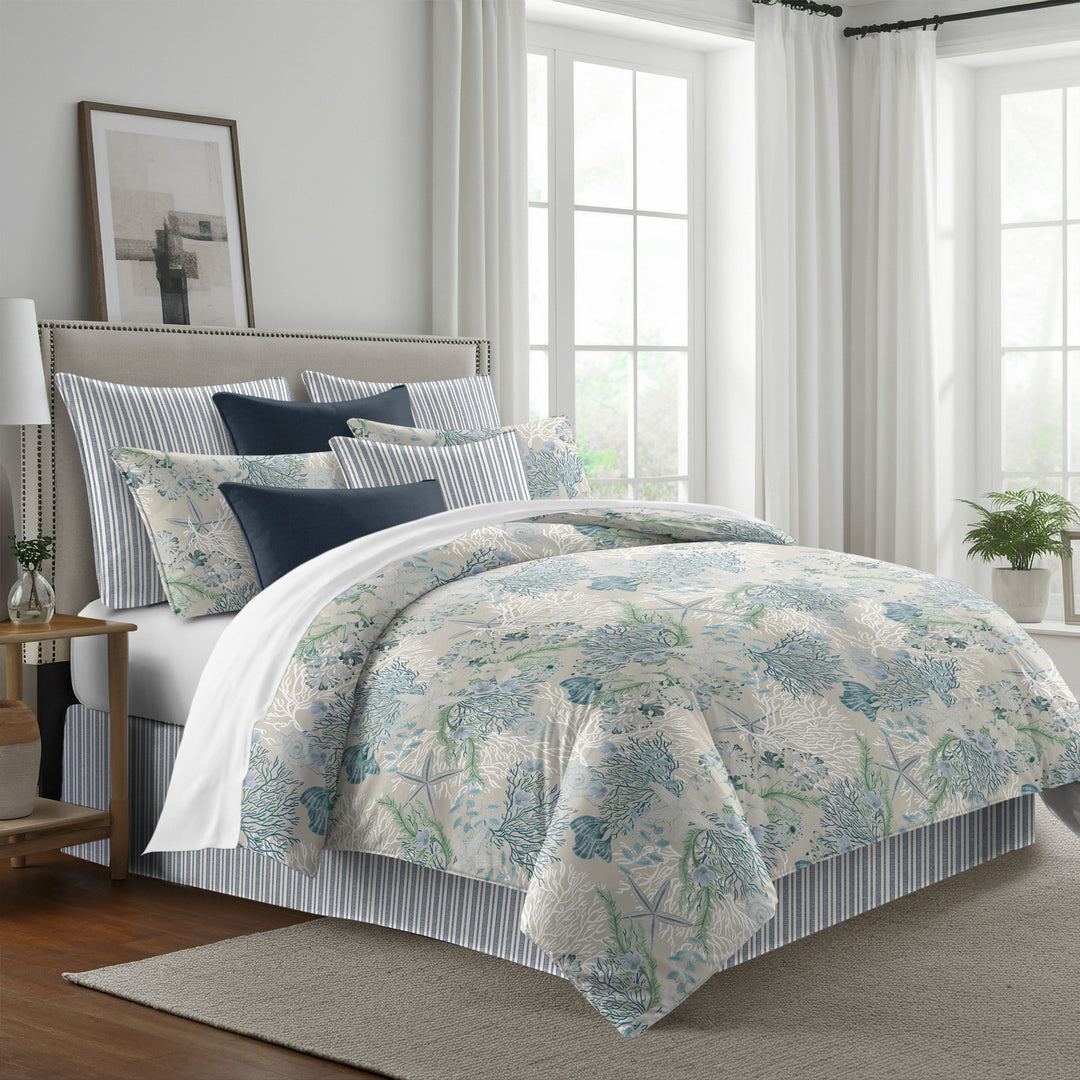 blue and aqua: Under the Sea duvet cover with blue and aqua marine motifs on a light background, styled with matching shams
