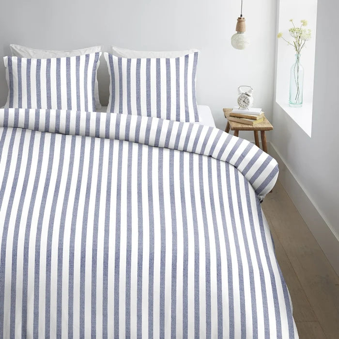 full bed: Ally 100% cotton duvet cover with blue and white stripes, styled on a bed with matching pillows