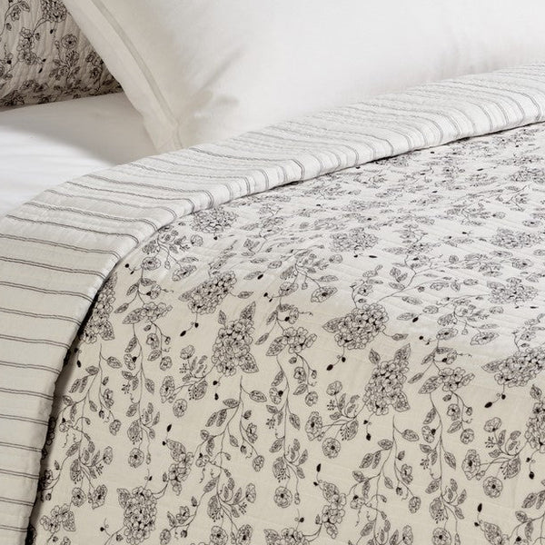 Countryside Chocolate Floral Quilt – 100% cotton, floral pattern on ivory background, shown flat