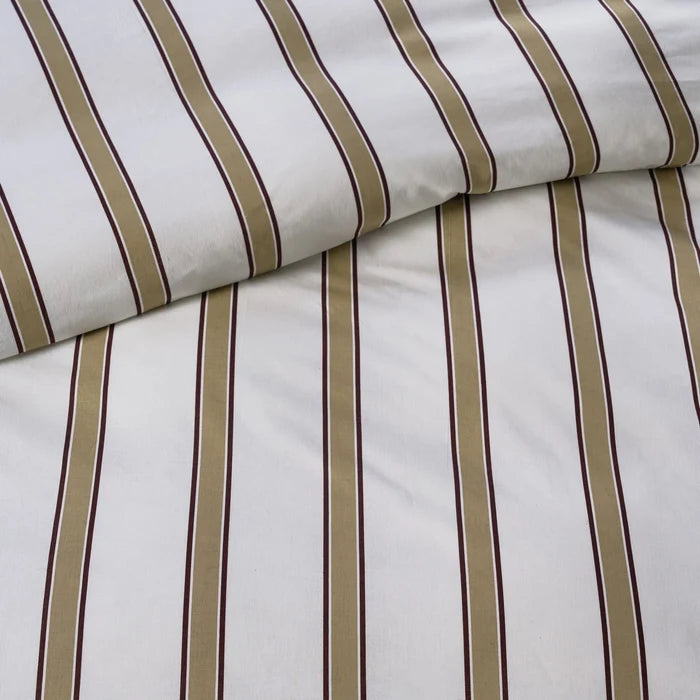 fabric detail: Dune cotton fabric detail showing tan stripes edged in burgundy on an ivory background