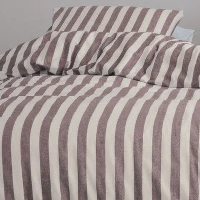 closer view: Close-up of Elias cream and burgundy striped flannel duvet cover folded back beneath matching pillows

