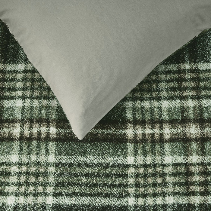 fabric detail: Elliot cotton flannel fabric detail showing green and cream plaid with a plain beige reverse
