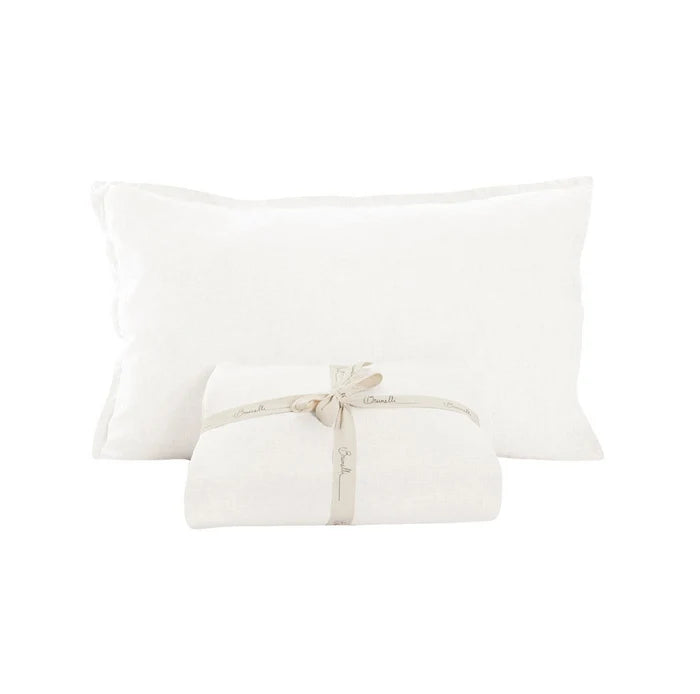 White image: Brunelli 100% Belgian linen sheet set in white with folded sheets tied with ribbon and a matching pillowcase