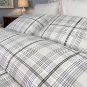 Close-up of Grayson grey and white plaid flannel duvet cover and pillow shams – soft warm flannel bedding by Cuddle Down
