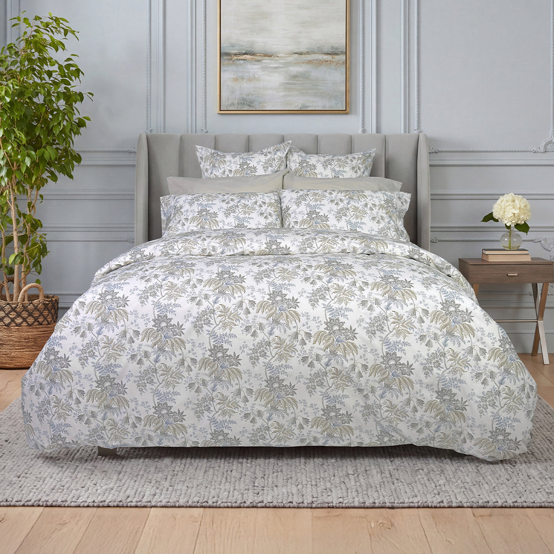 Heather botanical floral duvet cover and shams styled on a bed with grey upholstered headboard – 100% long-staple cotton by Cuddle Down
