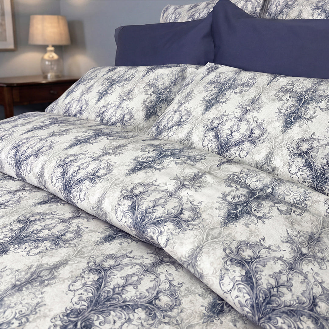 Close-up of Manor baroque scroll print duvet cover in navy and grey on white – soft percale cotton bedding by Cuddle Down
