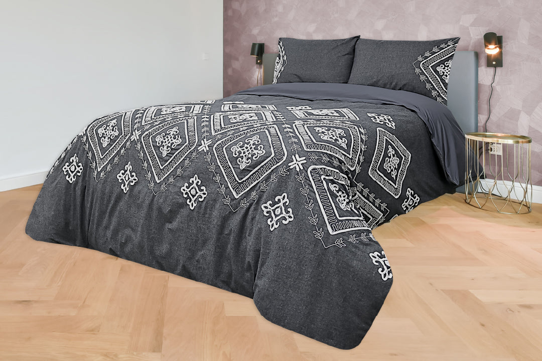 Neville brushed cotton duvet cover set styled on bed showing soft texture and neutral tones