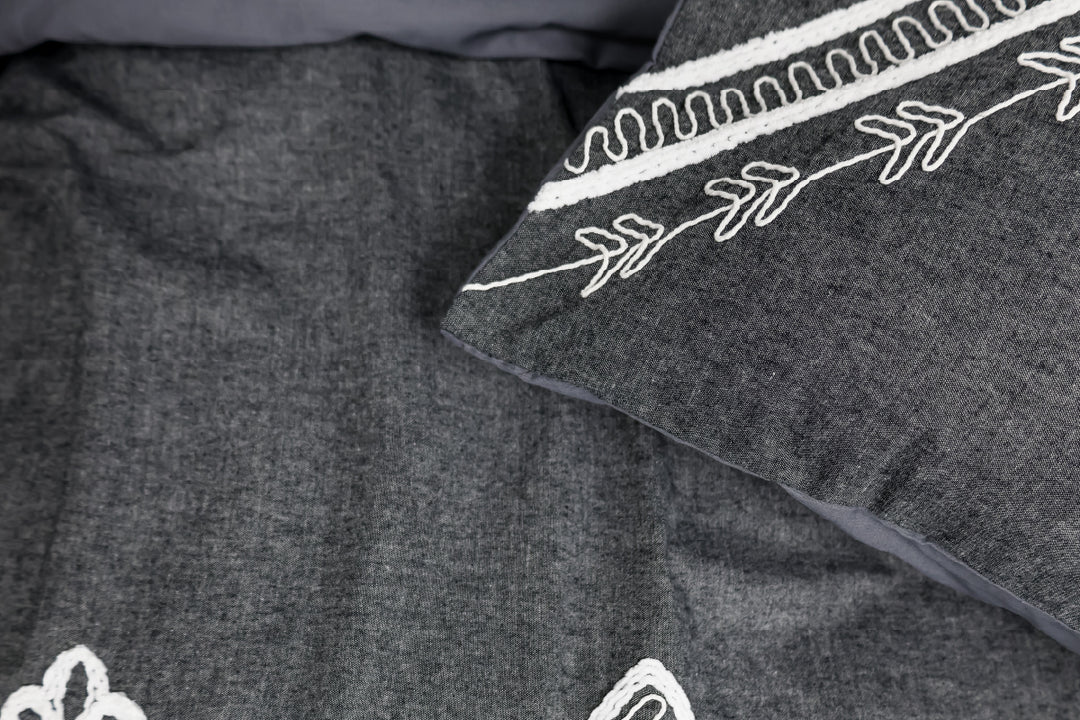 Close-up of Neville duvet cover fabric detail showing 100% brushed cotton texture