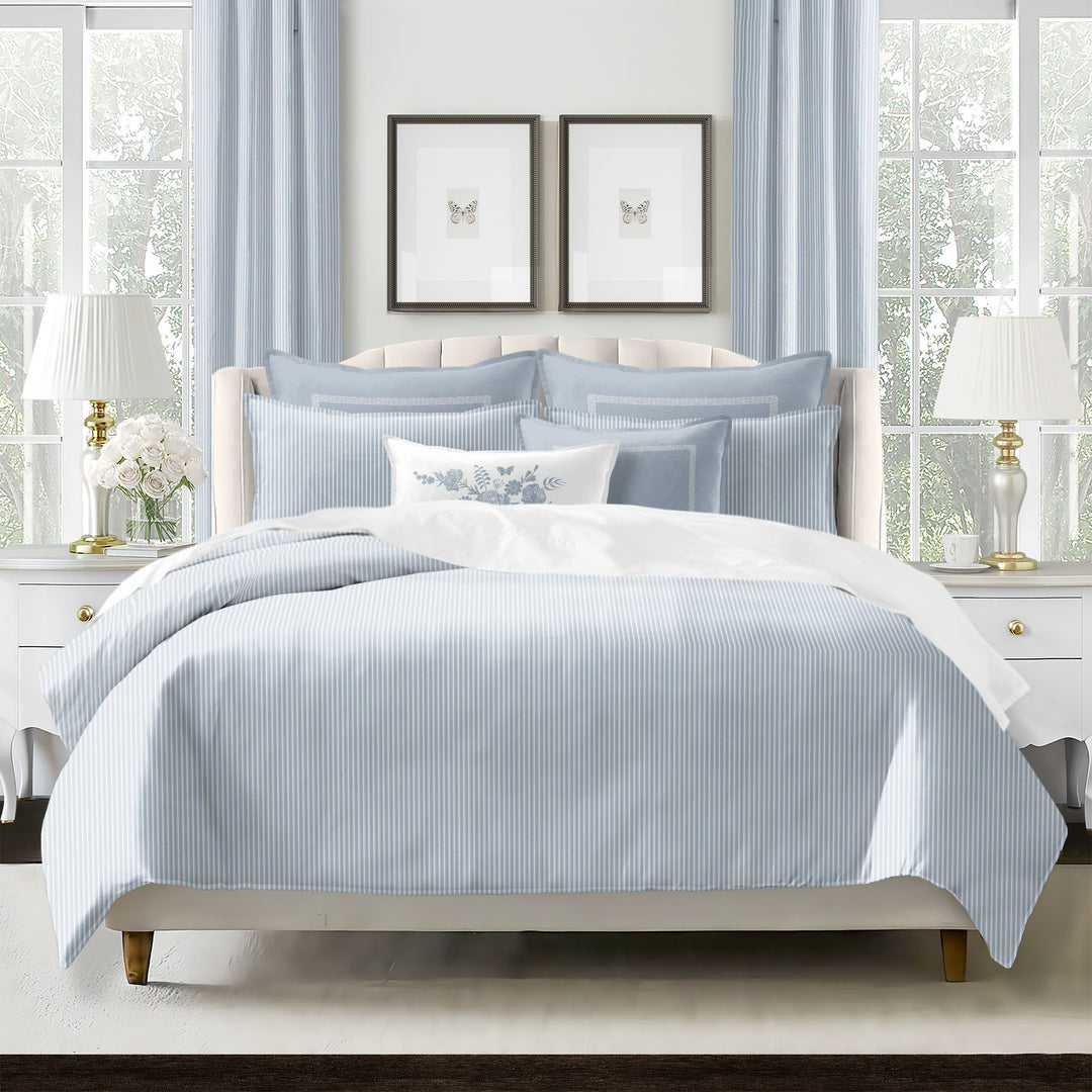 Ruben Stripe Cornflower Duvet Cover Set on bed – Made in Canada, 100% cotton twill