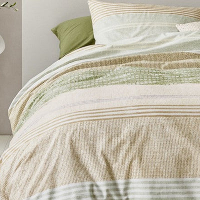 closer view: Close-up of Shitake green duvet cover showing patterned horizontal bands in green, beige and cream