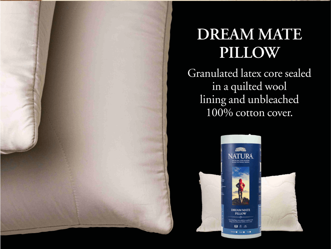Natura Dream Pillow styled on a neatly made bed in a bright, modern bedroom setting