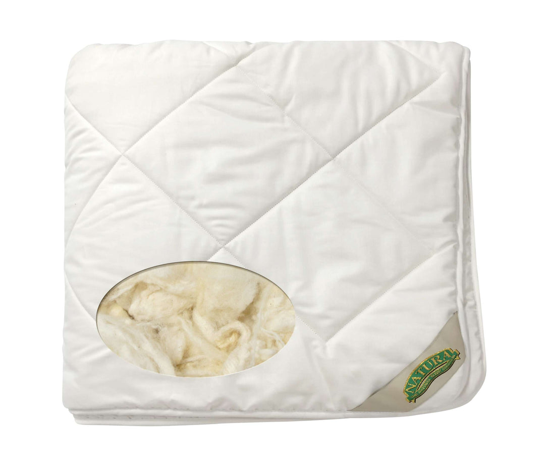 Natura Deluxe Washable Wool Duvet folded flat showing white cotton sateen cover