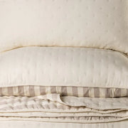 Ann Natural Solid Quilt – Embossed floral microfiber in natural, shown flat
