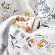 Close-up of Camille duvet cover 300 thread count cotton sateen weave showing soft texture and romantic floral print detail