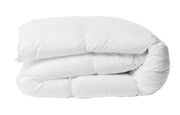 Bamboo all seasons duvet on a styled bed, breathable and temperature-regulating year-round