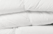 Deluxe bamboo duvet styled on a bed with white pillows, premium eco-friendly bedding
