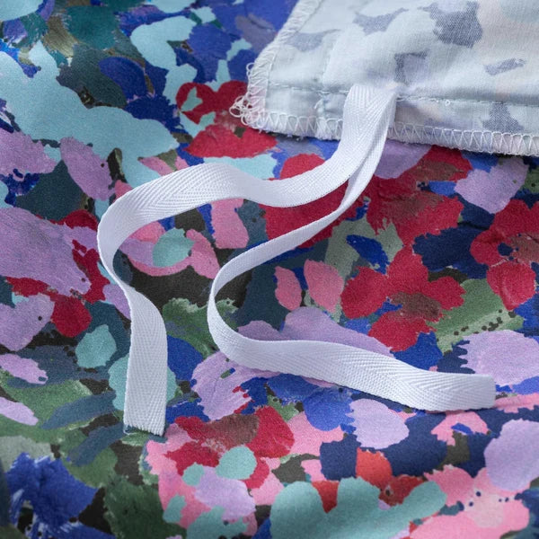 Interior corner ties on the Florisse floral duvet cover for securing a duvet insert.