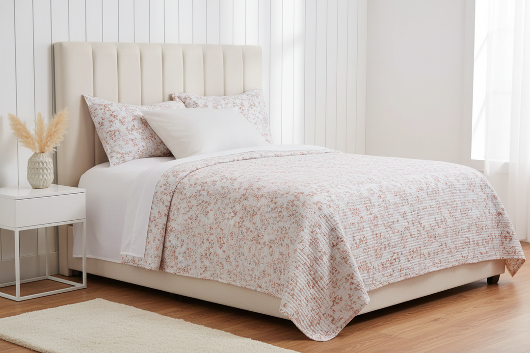 Marjolaine quilt with a terracotta foliage print