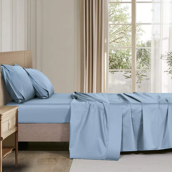 Organic cotton sheet set neatly folded, eco-friendly and hypoallergenic available in multiple sizes