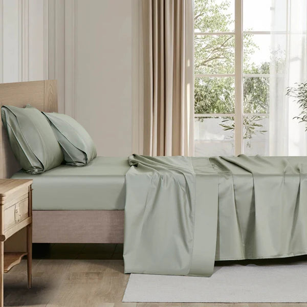 Organic cotton sheet set neatly folded, eco-friendly and hypoallergenic available in multiple sizes