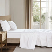 Organic cotton sheet set on a styled bed, soft breathable and naturally hypoallergenic