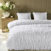 Romantic white ruffle duvet cover set made from 100% cotton with decorative ruffles and zipper closure