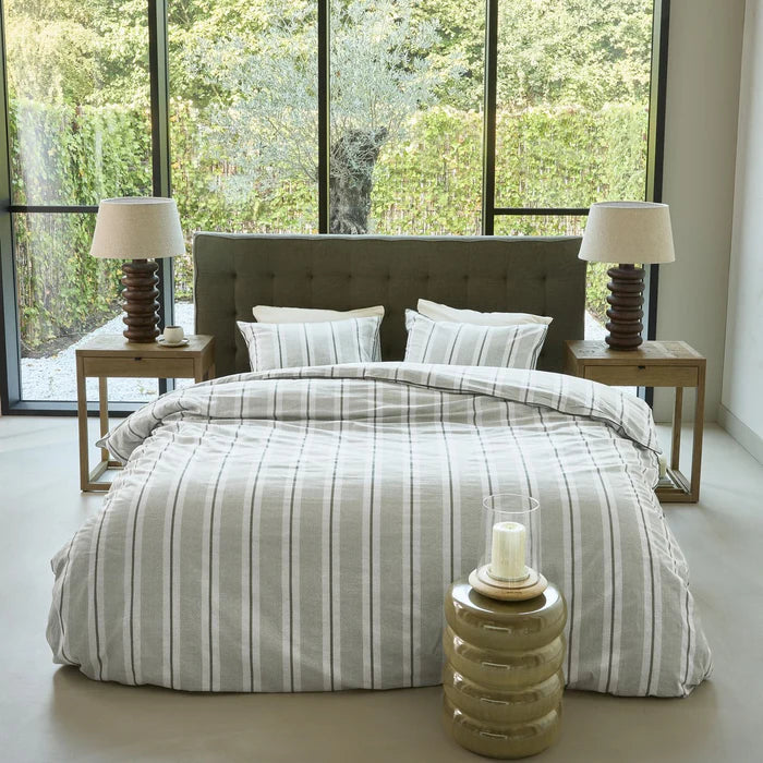 Silvan green striped duvet cover with chevron accents in 100% cotton - bedroom styled view