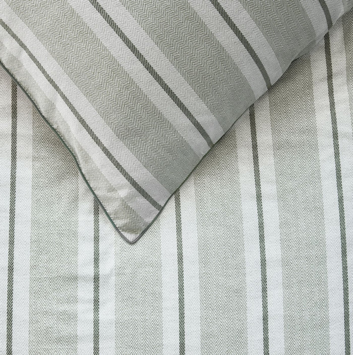 Close-up of Silvan green striped duvet cover showing dark and pale green pattern detail