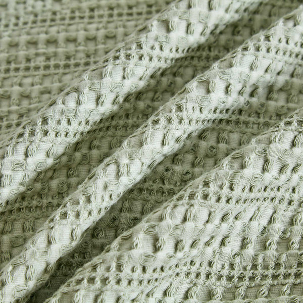 Close-up of Solene Seafoam fabric showing its textured waffle weave.